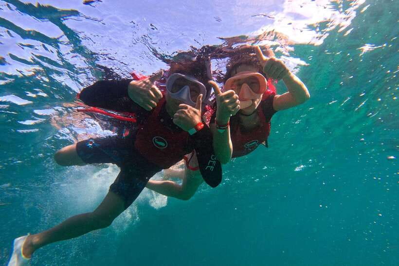 Boracay: Red Whale Party Cruise w/ Snacks & Water Activities - Kayaks, paddleboards, and snorkeling from the yacht