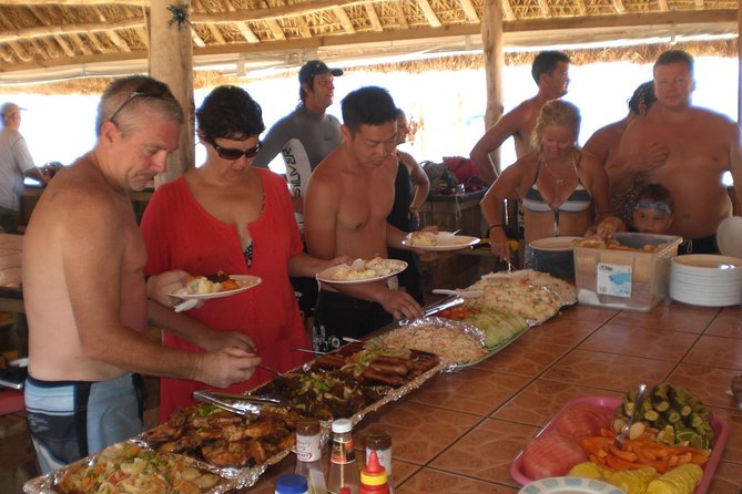 Fijian Islands and Snorkel Full-Day Whales Tale Cruise including Beach BBQ Lunch - Breakfast with Champagne and island views