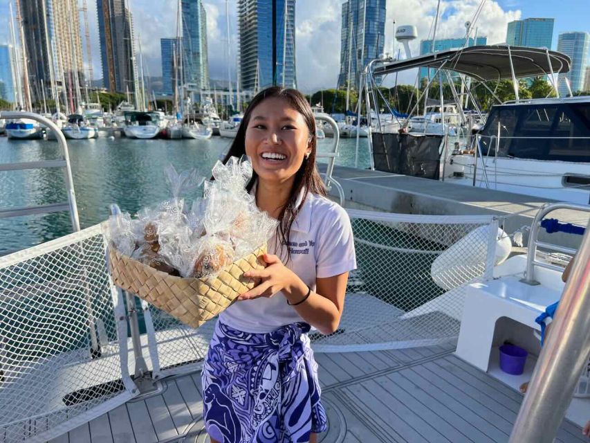Oahu: Waikiki Whale Watching Tour-Donut and Coffee Included - A crew-led hula show on the way home